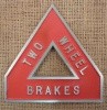 Warning Sign reads: TWO WHEEL BRAKES